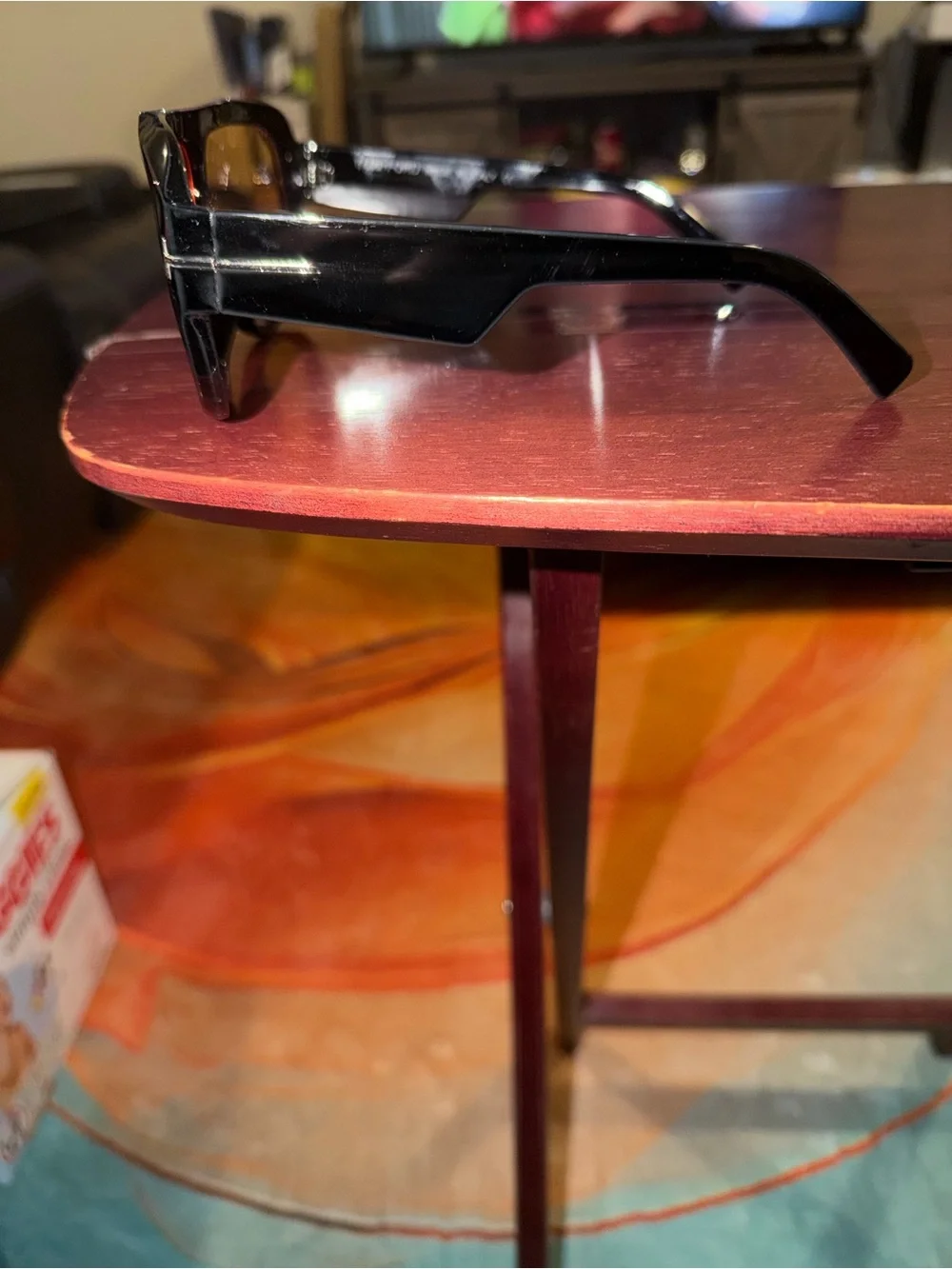 Tom Ford Black Frame Sunglasses with Orange Lenses